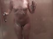 Wife takes a shower and shows her tits